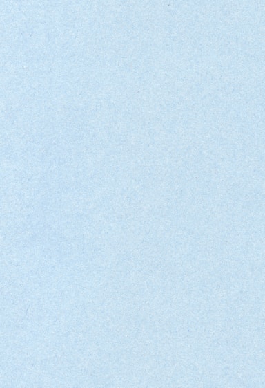 an airplane is flying in the sky on a clear day