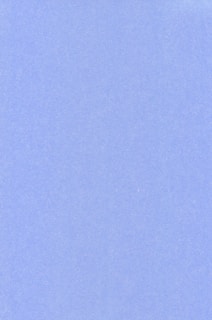 an airplane flying in the sky with a blue background
