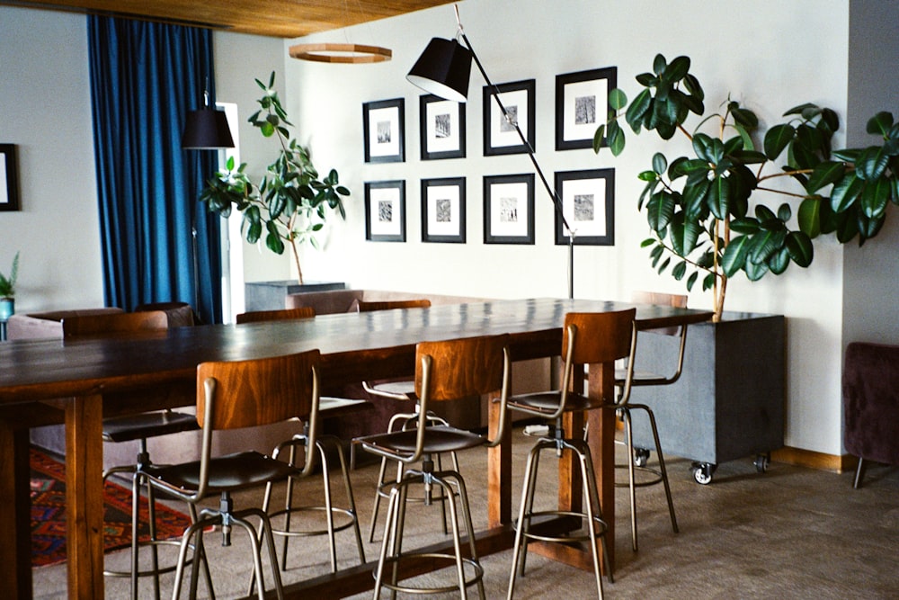 a dining room with a table and chairs