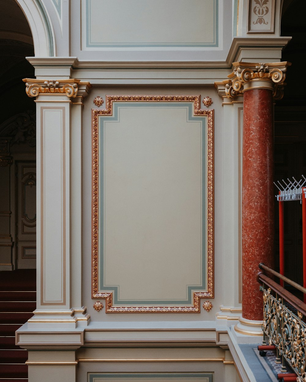 a room with a lot of columns and a big sign