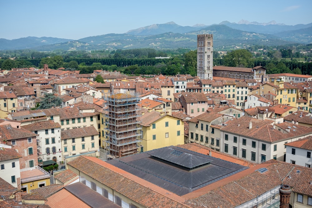 a view of a city with a tall clock tower