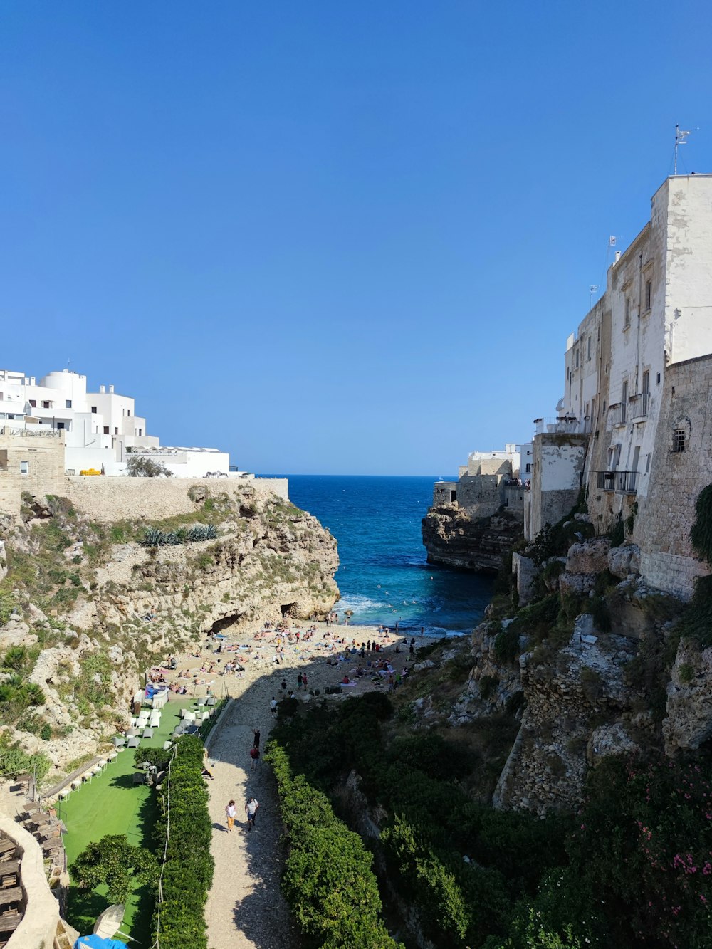 a view of a beach from a cliff