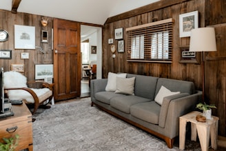 A cozy living room featuring elegant wooden furniture.