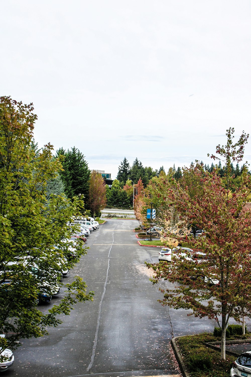 a parking lot filled with lots of parked cars