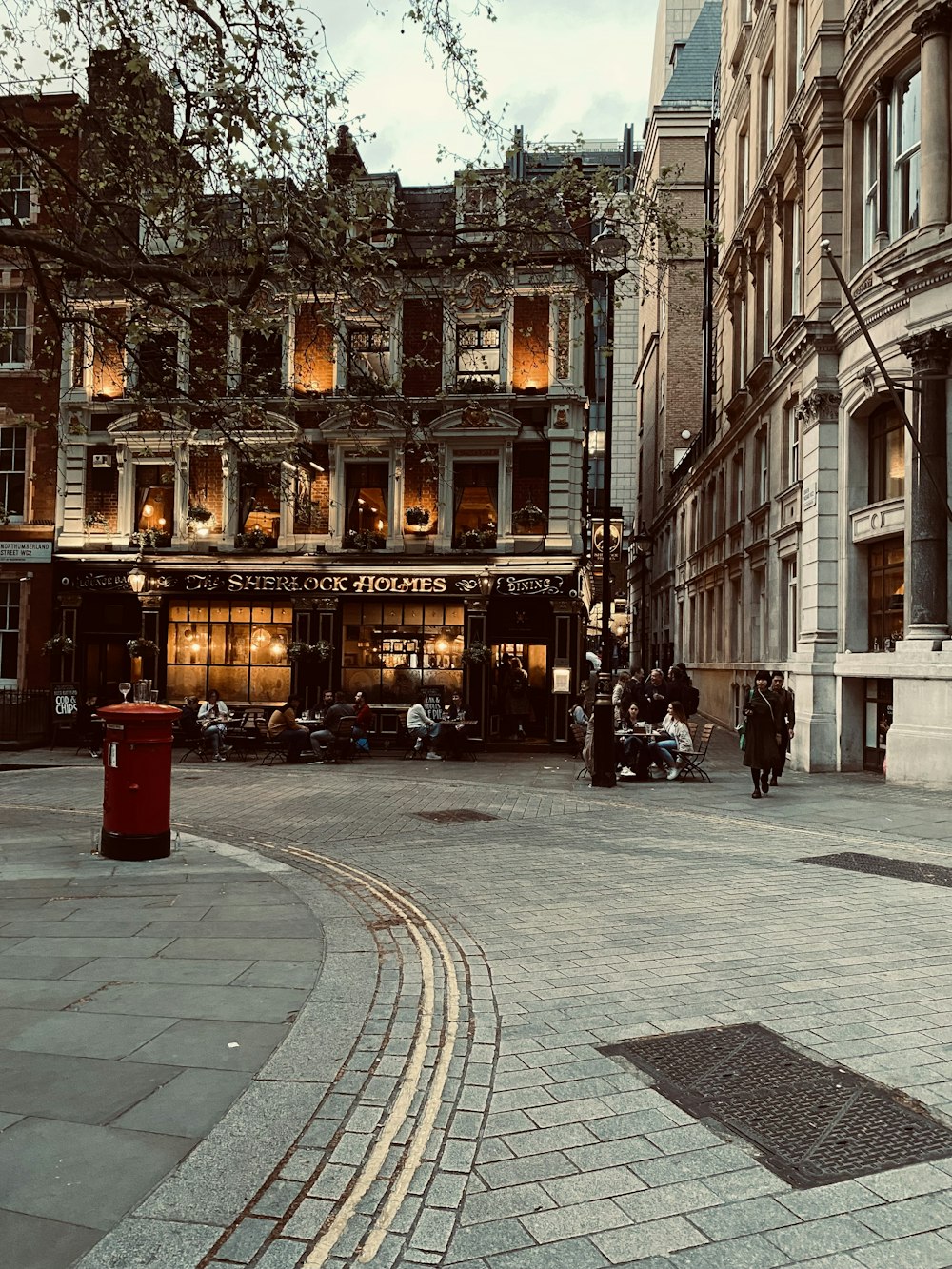 a cobblestone street in a european city