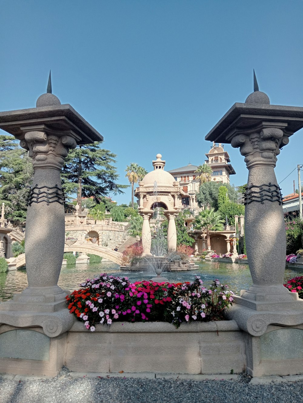 a couple of stone pillars sitting next to each other