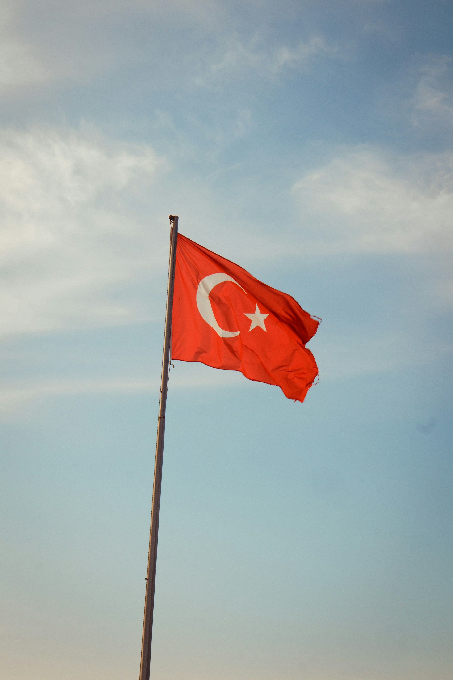 a red flag with a white star on it