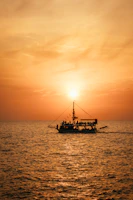A family laughing together on a sunlit sailboat, the warm glow of the setting sun casting long shadows.