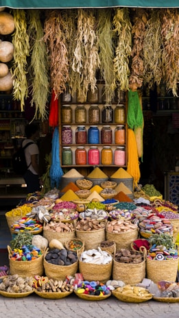 a market with baskets of food on display