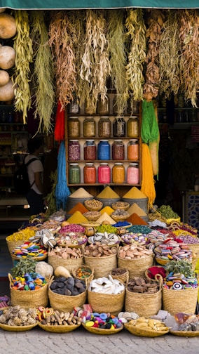 a market with baskets of food on display