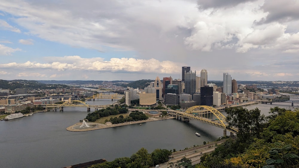 a view of a city with a bridge over a river