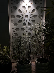 Close-up of decorative PVC wall panels with intricate patterns in a stylish interior