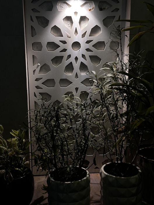 Close-up of decorative PVC panels with modern patterns in a cozy living room setting