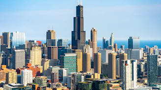 a view of a large city with tall buildings