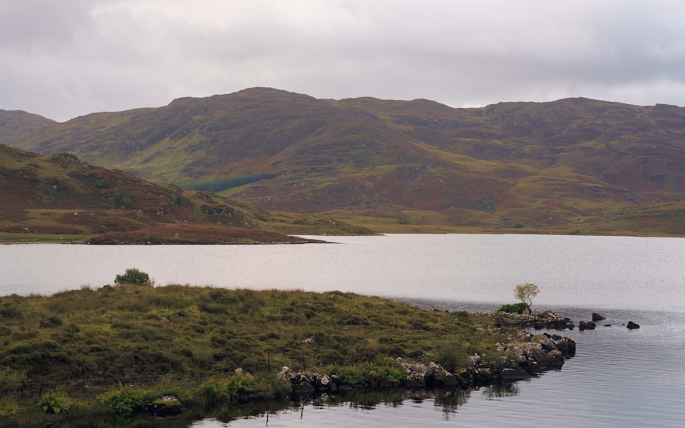 a large body of water surrounded by mountains