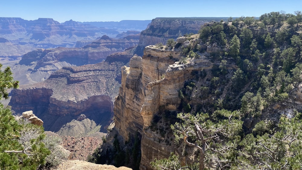 a view of the grand canyon from the rim of a cliff