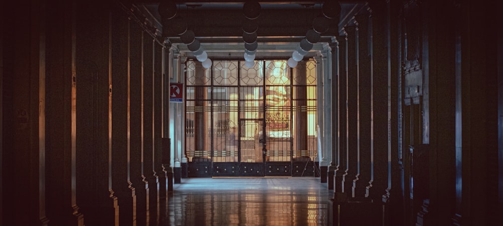 a long hallway with a clock on the wall