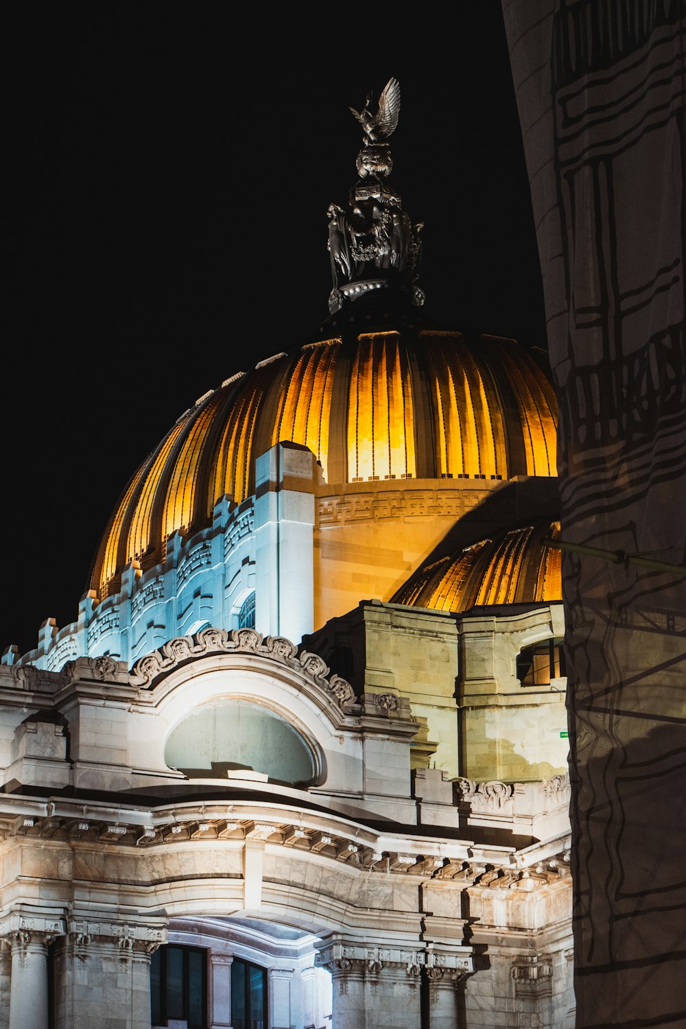 a building with a dome lit up at night