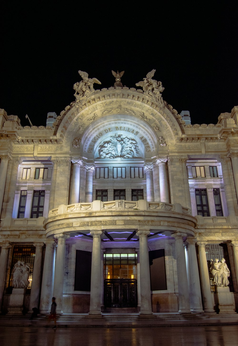 a large building with a clock on the front of it