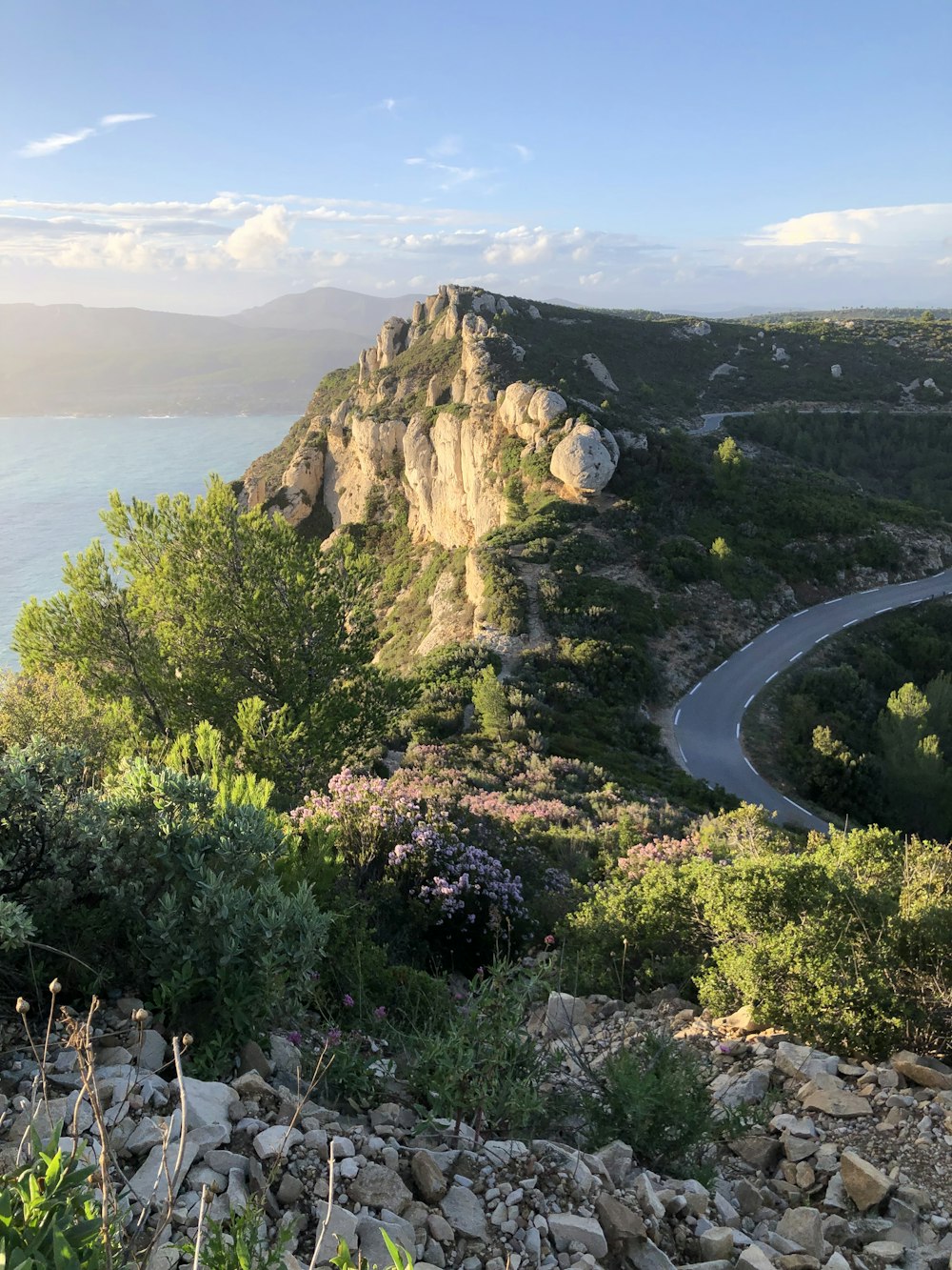 a winding road on the side of a mountain