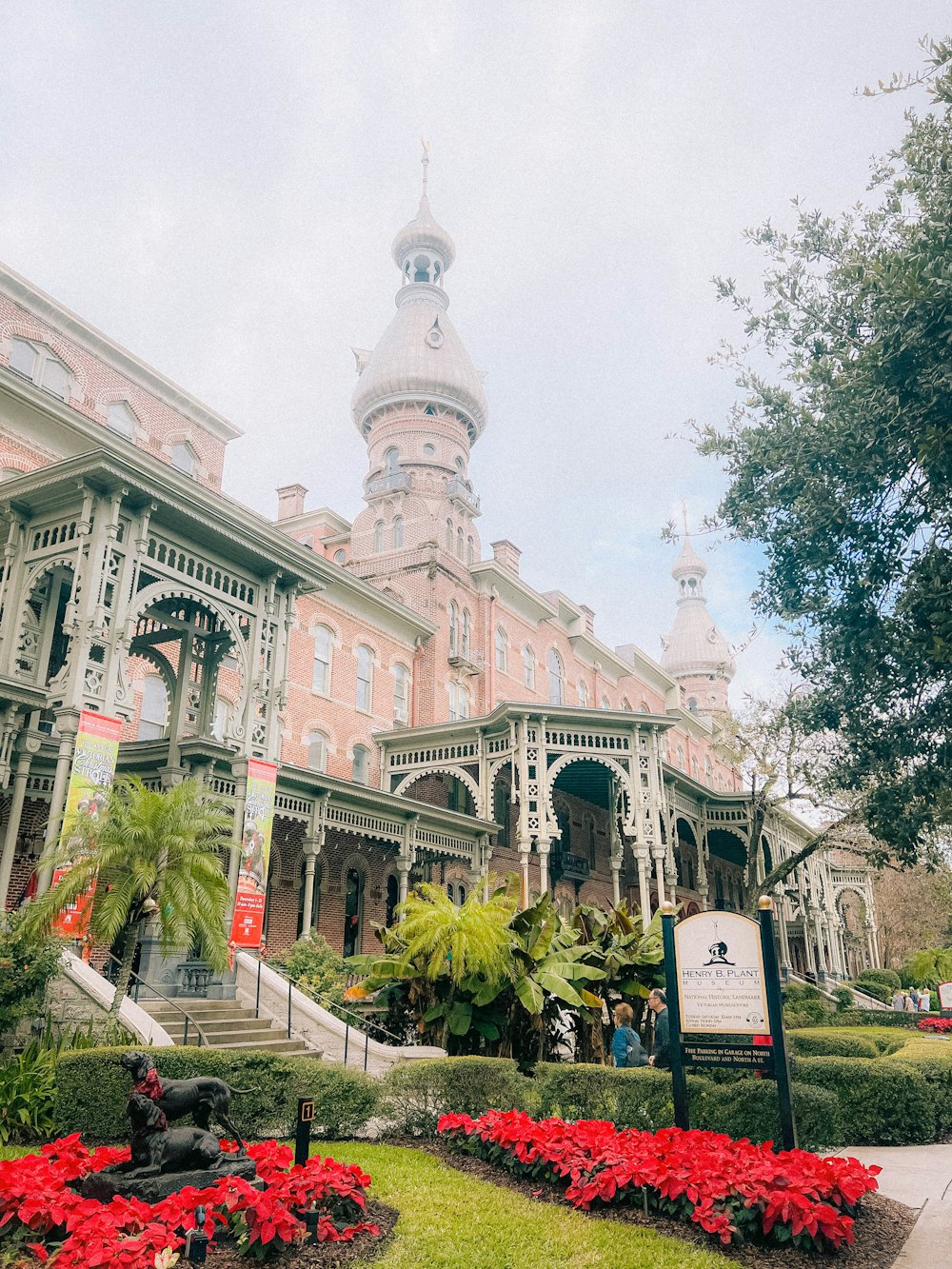 a large building with a clock tower in the background