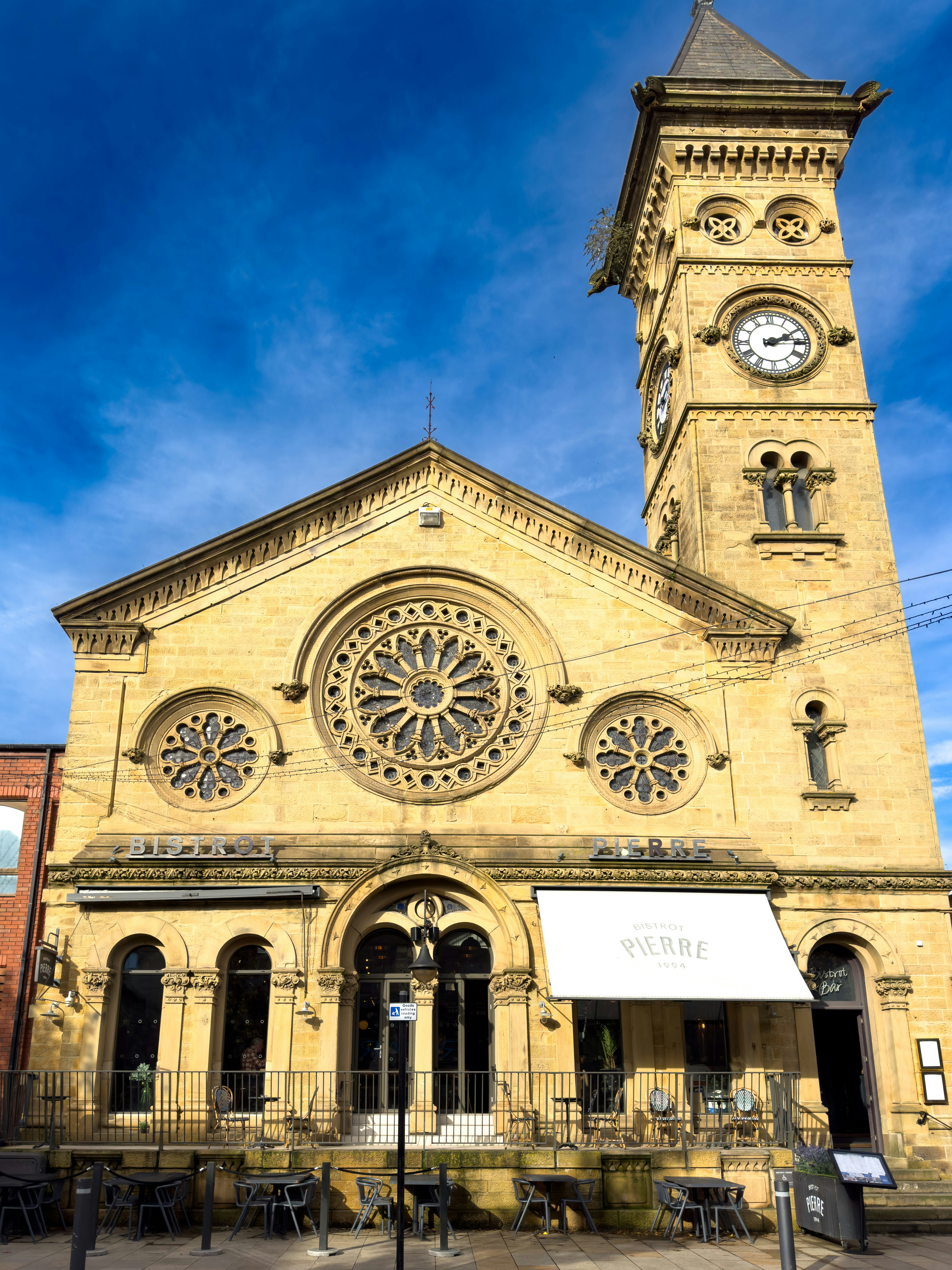 a large church with a clock tower on top of it