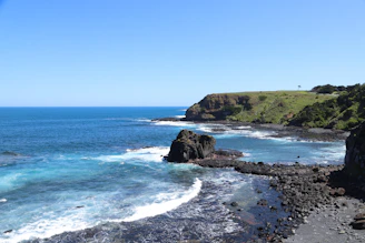 Vibrant coastal landscapes with creators capturing local culture and scenic views.