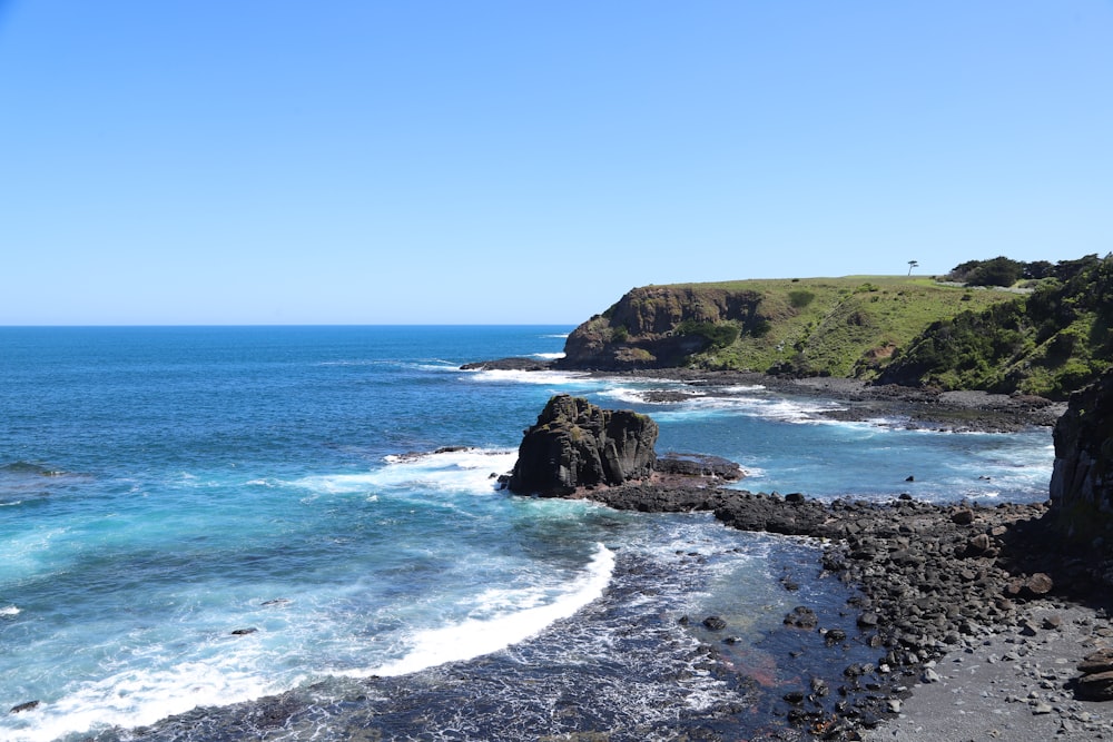 a view of the ocean from a cliff