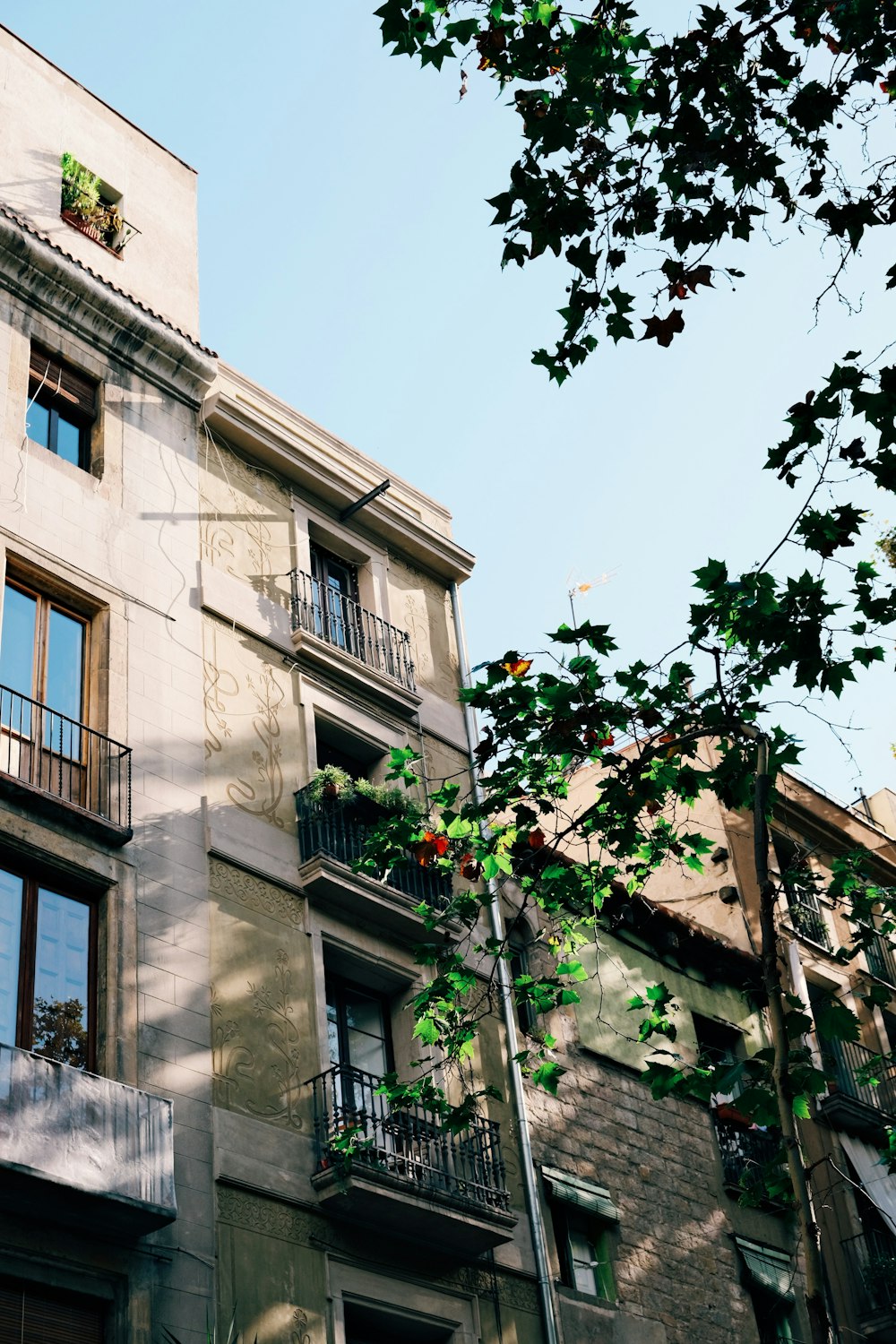 a tall building with balconies and balconies on the balconies