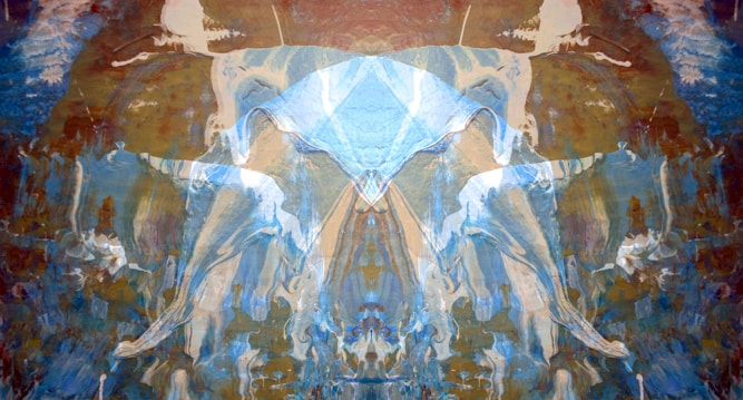 An abstract composition featuring symmetrical patterns resembling a Rorschach test. The image is dominated by hues of blue and brown, with fluid, wave-like shapes. The patterns evoke a sense of movement and depth, possibly resembling ethereal figures or forms.