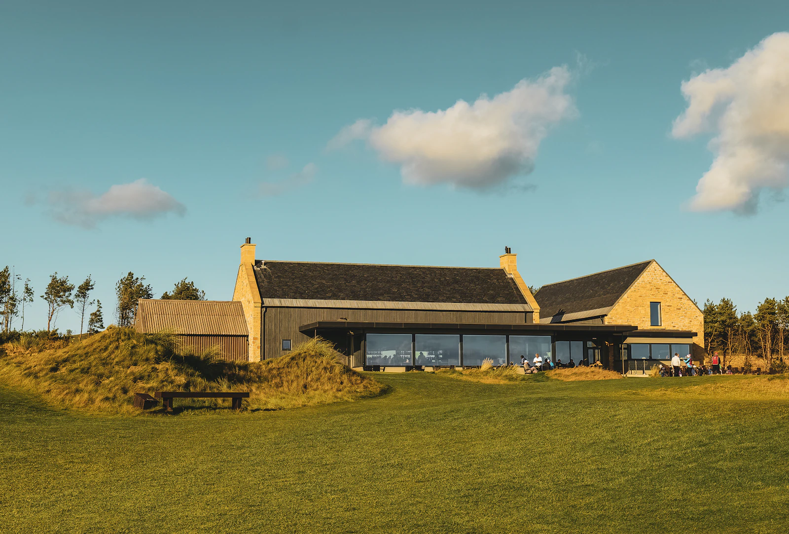Links clubhouse overlooking the course in evening light