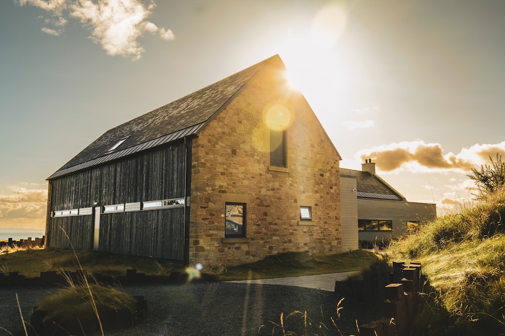 the sun shines brightly on a brick building