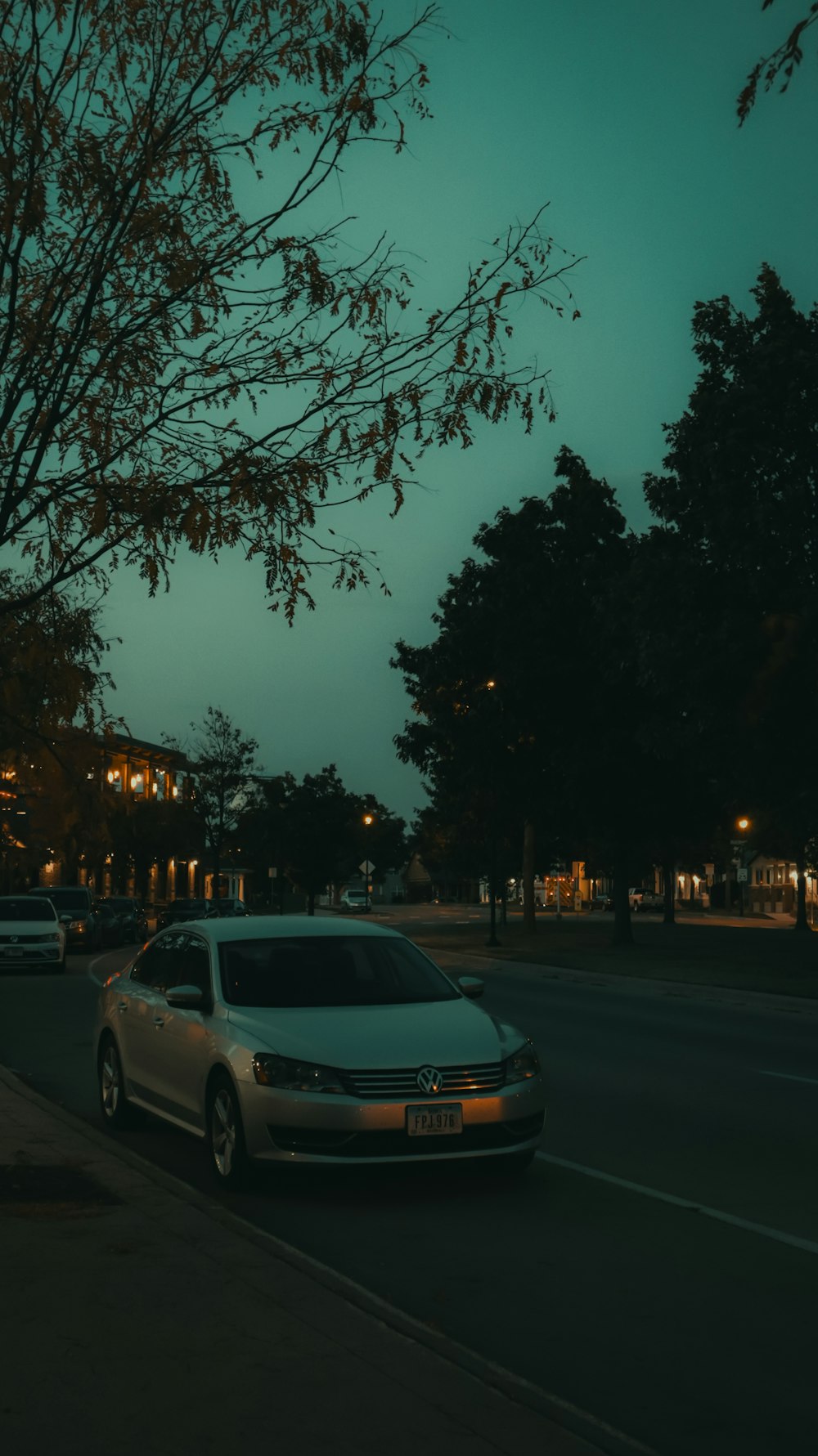 a car is parked on the side of the road