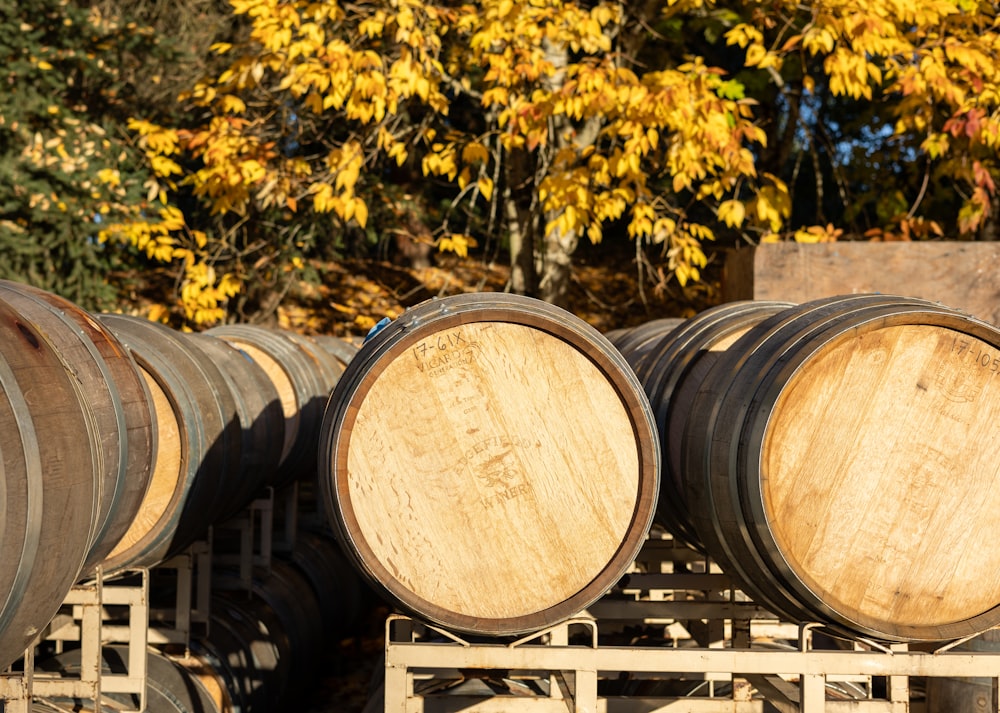 several wooden barrels stacked on top of each other