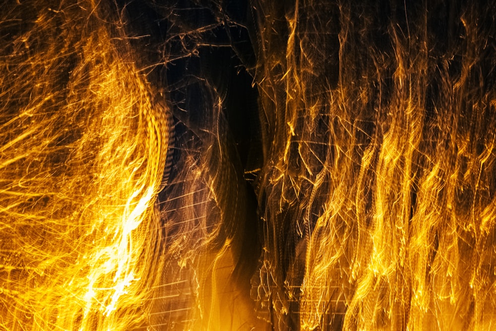 a close up of a fire in the middle of the night