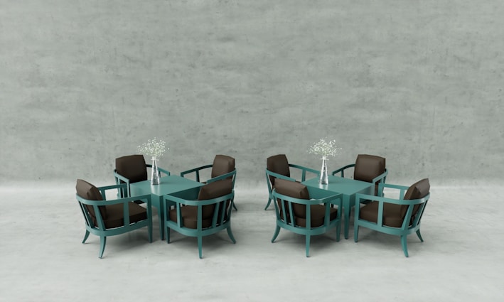 A modern restaurant table set with elegant accent chairs.