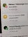 A digital notification on a screen announces the achievement of reaching 500,000 downloads. The message is accompanied by a gold trophy icon symbolizing success. The background shows other notifications with interactions from a social media platform.