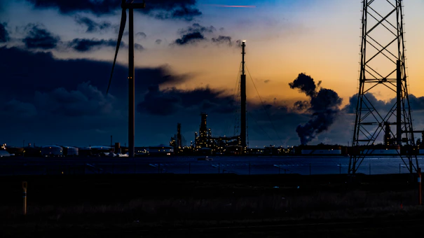 An energy plant at sunset symbolizing industrial risk management.