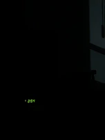 The red 11:11 LED clock illuminating a dark room with the movie poster in the background.