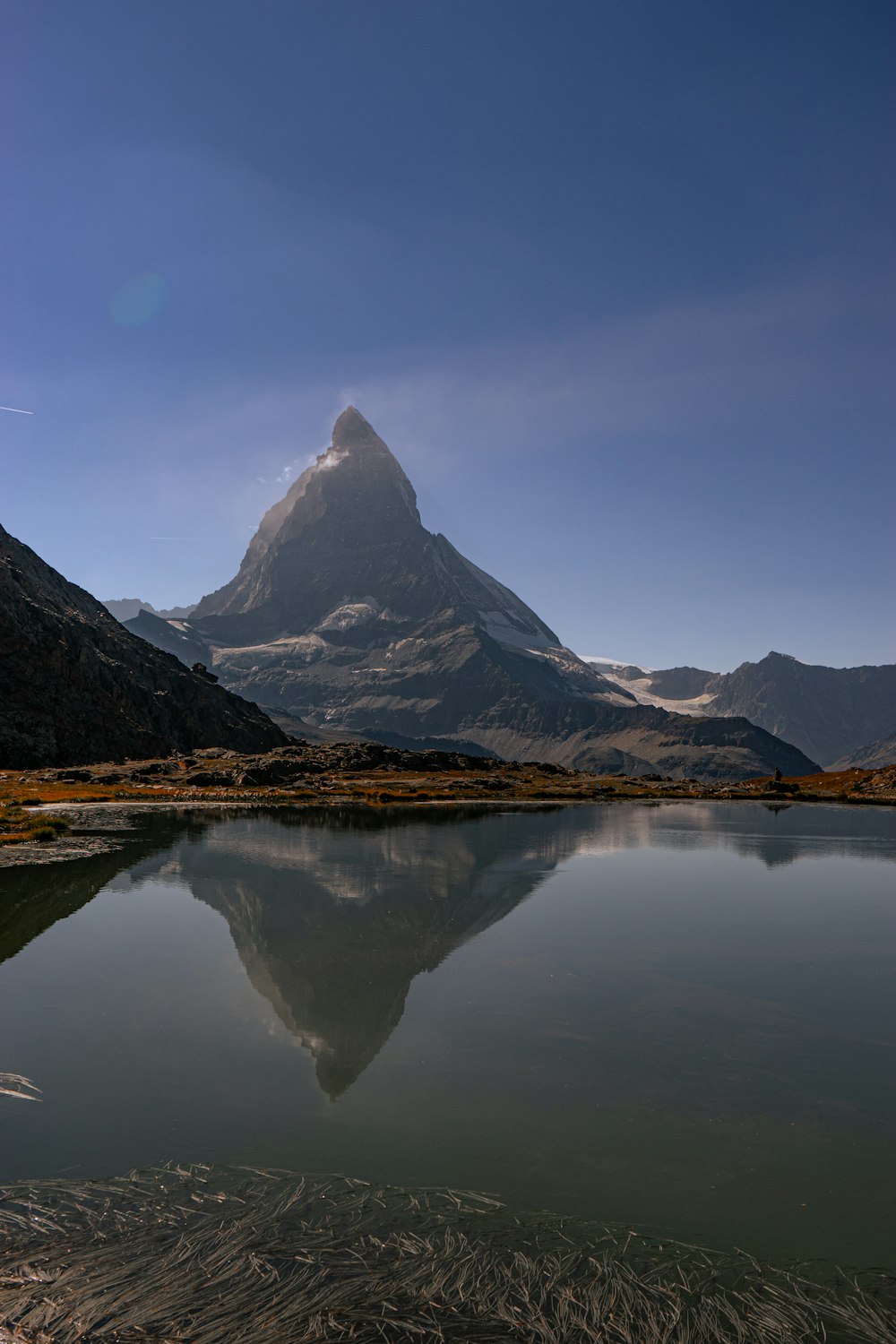 a mountain with a lake in front of it