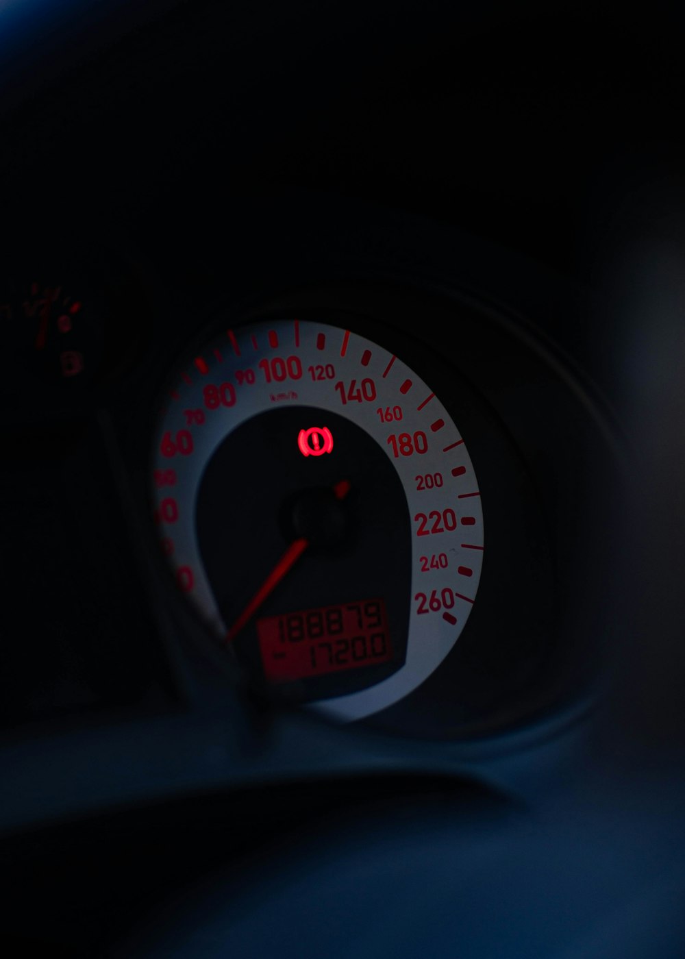 a close up of a speedometer in a vehicle