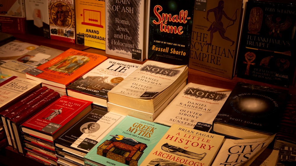 a bunch of books that are on a table