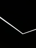 A minimalist design featuring a single white angular line traversing a black background, creating a stark contrast and geometric aesthetic.