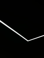 A minimalist black and white design featuring geometric shapes.