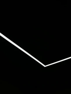 Close-up of a sleek, minimalist logo design on a clean white background.