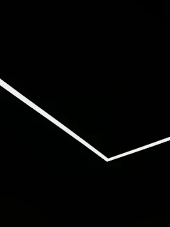 Minimalist design featuring clean lines in black and pastel pink.