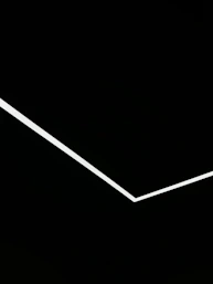 Minimalist design showing a single strong signal pathway illuminated against dark background.