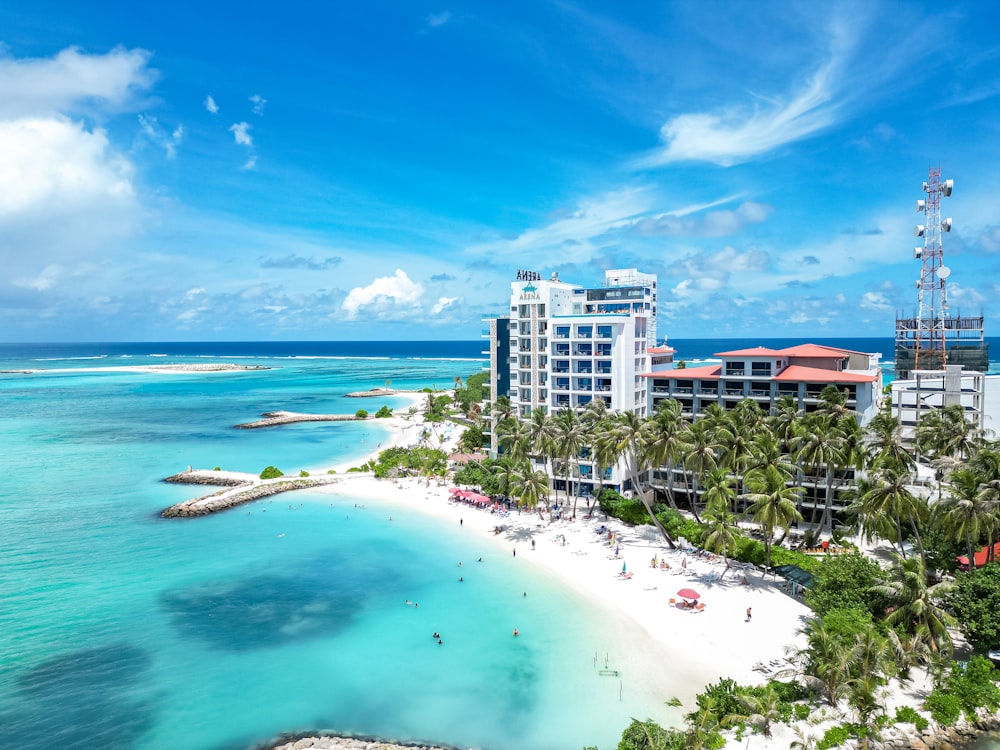 an aerial view of a beach and hotels