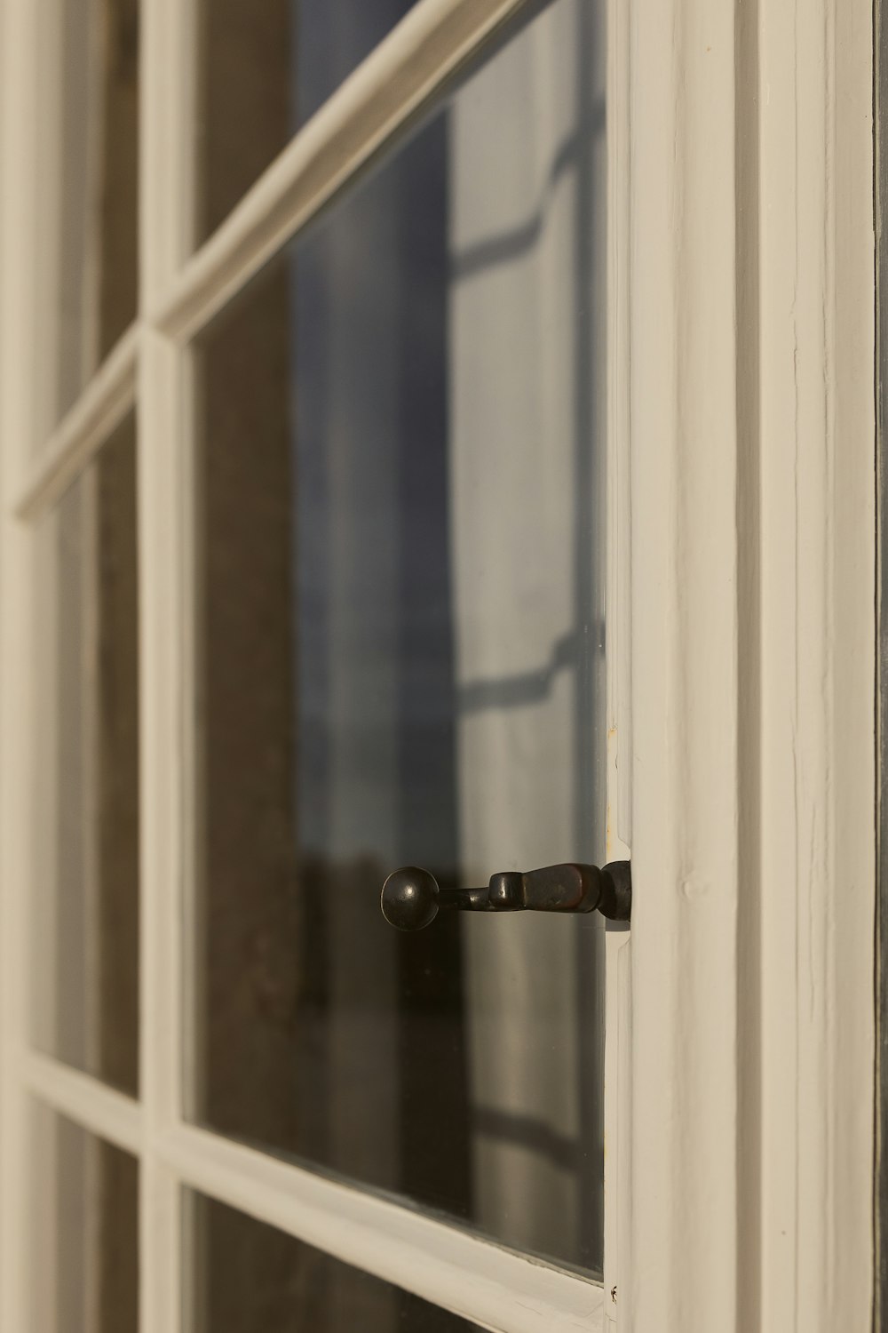 a close up of a window with a handle