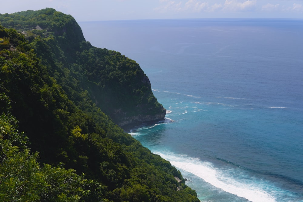 a view of the ocean from a high cliff